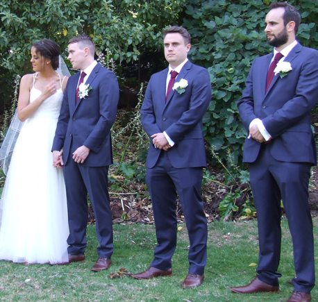 Nigel Walker with bride Caroline, and with best man Will Ryall (centre) and groomsman Murray Walker.