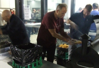 Cricket Premiership players get to work on feeding the masses: L-R Paul Hobbs, Brett Curran and Dean Lawson.