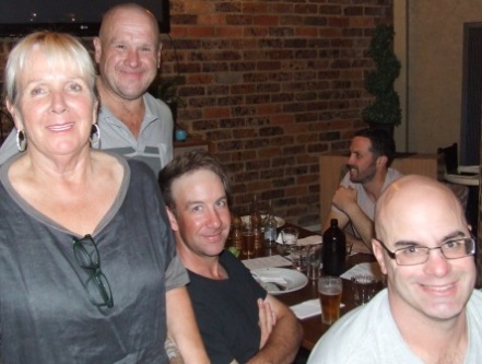 Postie's 50th: L-R Adele Walker, Peter Smith, Ben Thomas and Michael Cumbo, with Michael Ozbun in the background.