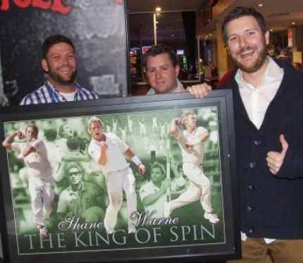 Jeremy Davey (far right) celebrates his auction pick-up with teammates Geoff Shiell (left) and Ed Rayner.