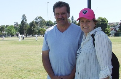Coach Tony Gleeson and Nicole McLachlan kept one eye on the cricket while attending the fundraiser.