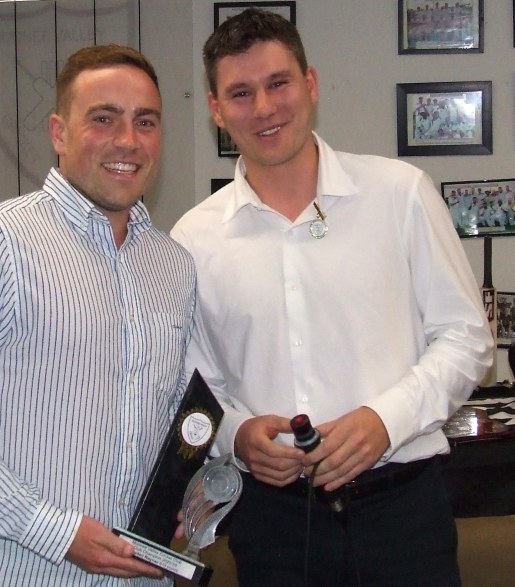 Hayden Rayner receives his Club Champion award from past First Eleven captain Jack Newman (far right).