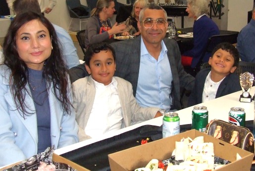 A Premiership and three awards - a big night for Sudarshan Devkota, here with wife Laxmi and sons Swatit and Swakrit (right).