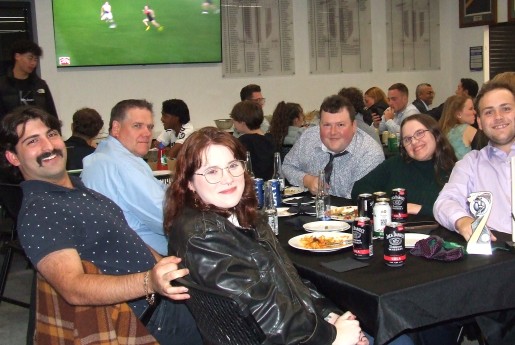 A happy table: Clockwise from front - Beth and Ben Baldacchino, Geoff Smith, Andreas Skiotis, Makealah and Lachlan Smith.