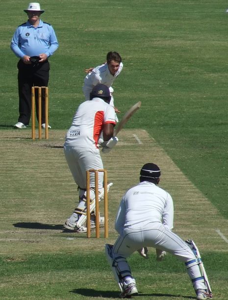 Dejan Gilevski bowled tightly - Suraj Weerasinghe behind the stumps as the ball cuts in.