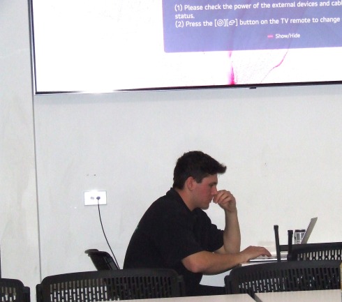 Pondering the draft order: Organiser Jack Newman below the big screen.