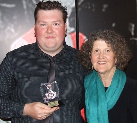 Andreas Skiotis and mum Jill with his 100-game milestone award.
