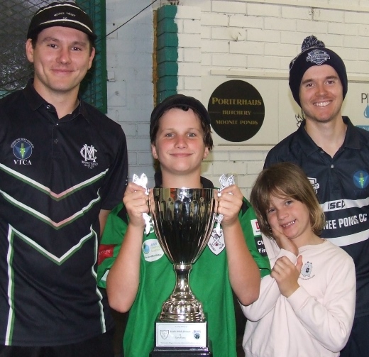 Honoring Heath and Gary: Captains Jack Newman (left - Moonee Valley) and Patrick Didham (Moonee Ponds) with the Cup and Heath Webb-Johnson's children Reid and Bree.