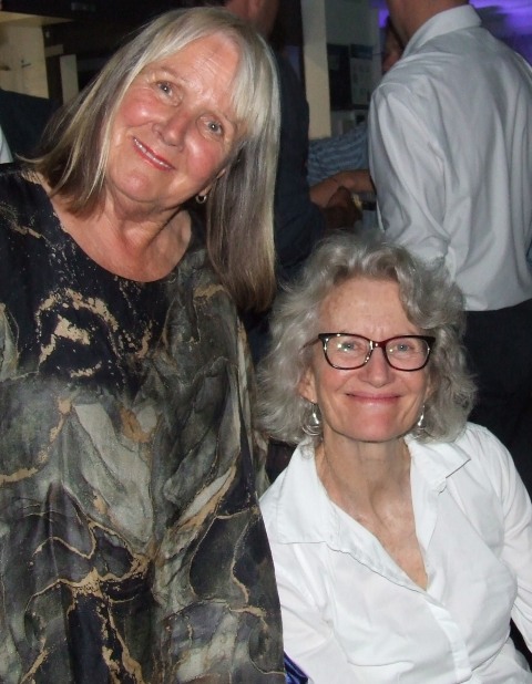 What can we do when our husbands are helping serve drinks? Adele Walker (left) and Clare Henderson.