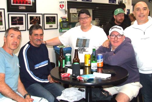 These punters keenly studied the form guide for each of the teams before placing their bids: L-R Jim Polonidis, Tony Gleeson, Mark Gauci, Tony Nilsson, Bede Gannon and John Talone.