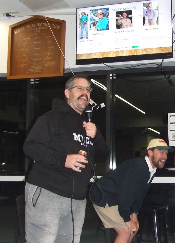 Brendan 'Jonty' Rhodes was the auctioneer at our Player Auction. Coach Brayden McGregor tries to find a bid under the table.