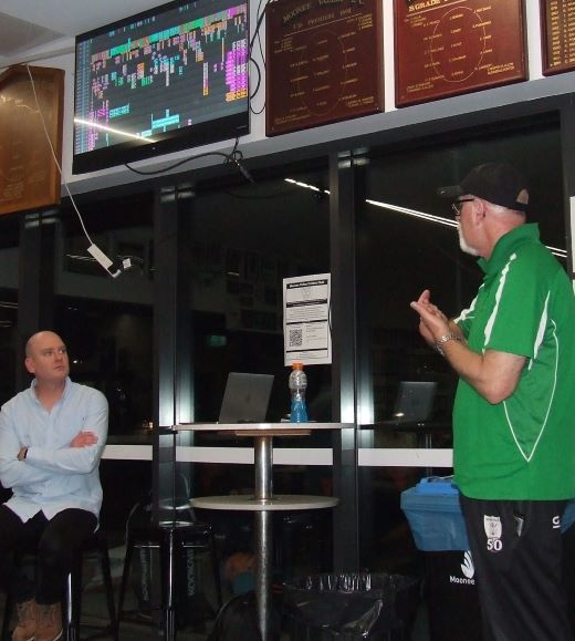 Mike Mulgrew (left) under the editing technicals on the big screen at Ormond Park - with MC Kevin Gardiner.